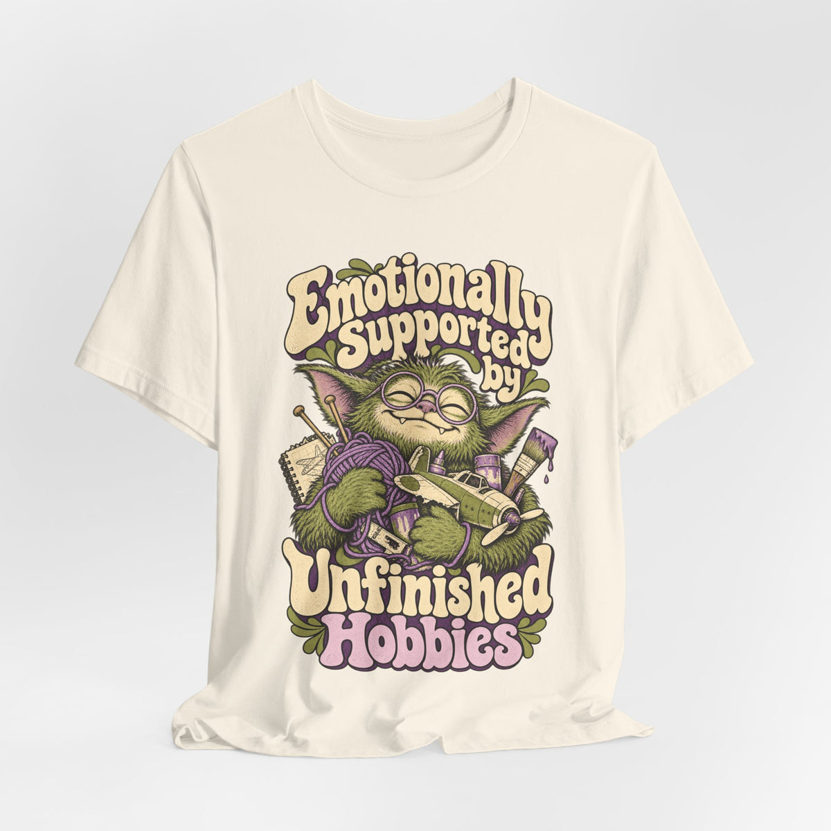 Emotionally Supported by Unfinished Hobbies — Unisex Tee