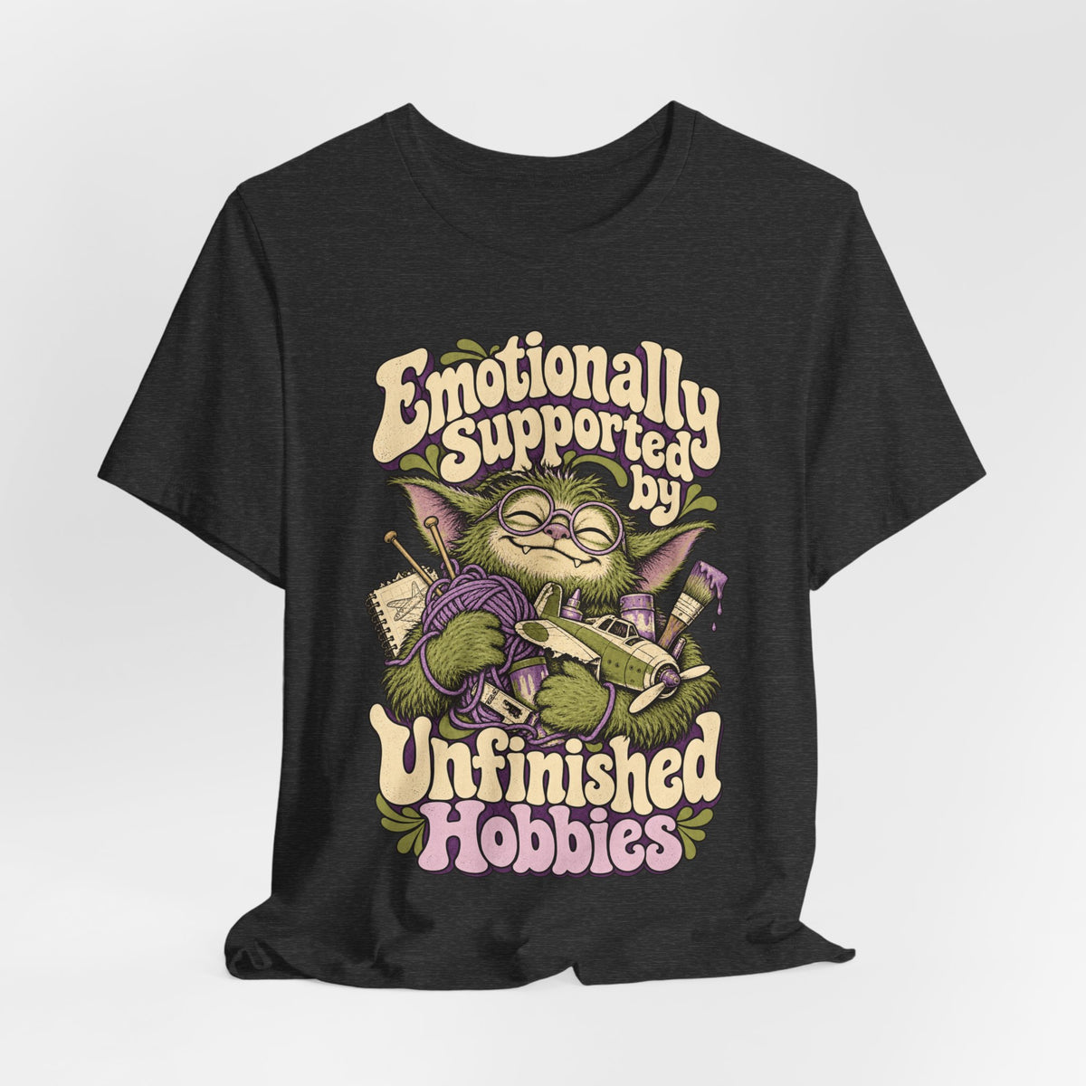 Emotionally Supported by Unfinished Hobbies — Unisex Tee